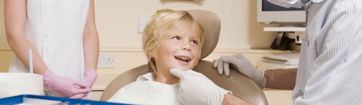 happy kid in dental office