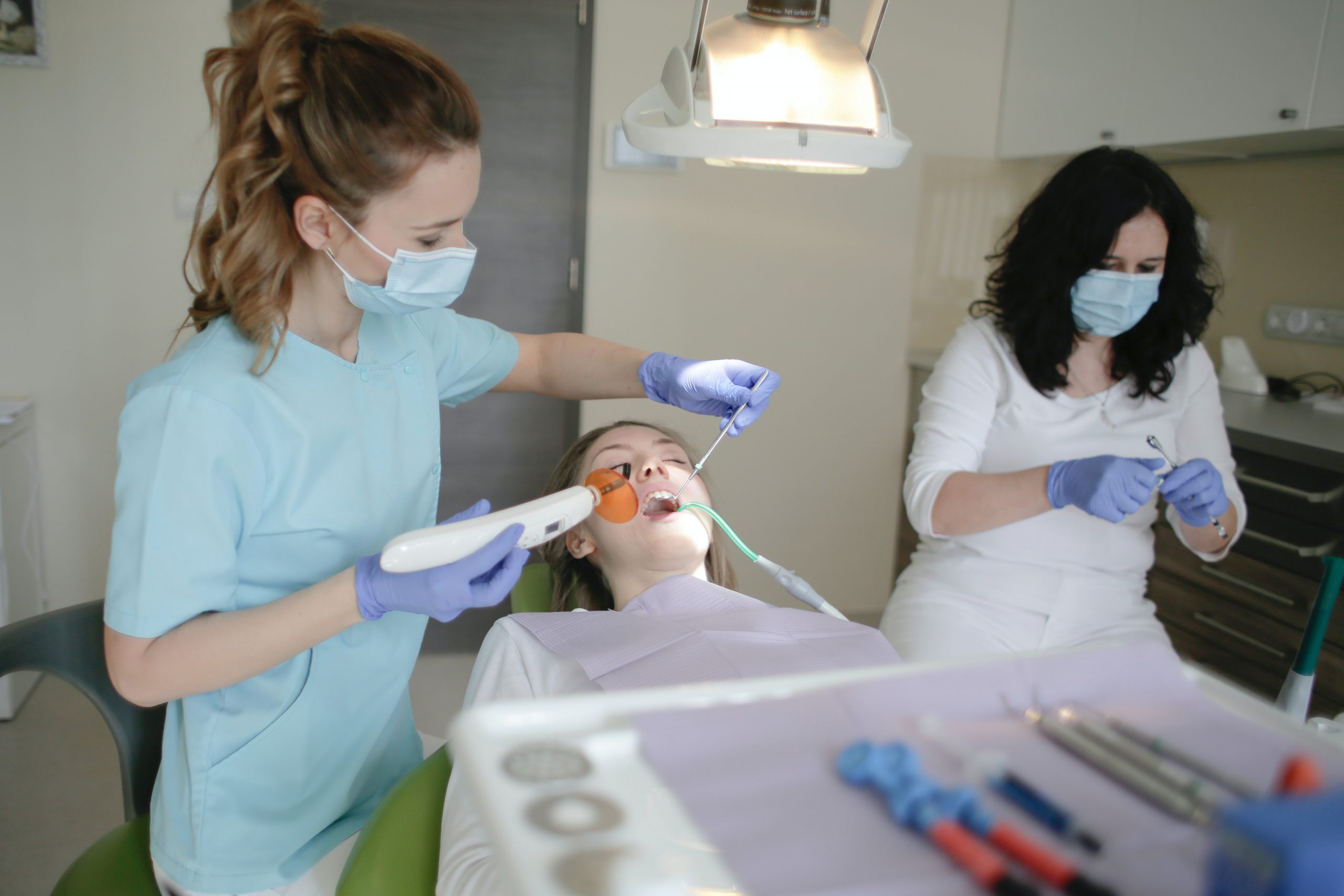 dentists working on patient